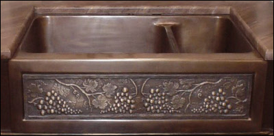 Bronze Ktchen Sink with custom art skirt.