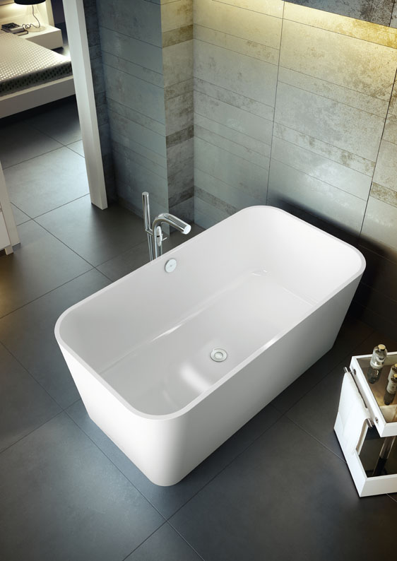 The New tub from Victoria + Albert is called "The Edge".  Strikingly linear contrasted with soft contoured corners, this double ended design is perfect for two people.  To compliment the tub, Victoria + Albert also offers a white rimless basin which mirrors the tub's shape.  Both pieces are made of volcanic limestone and hand finished.